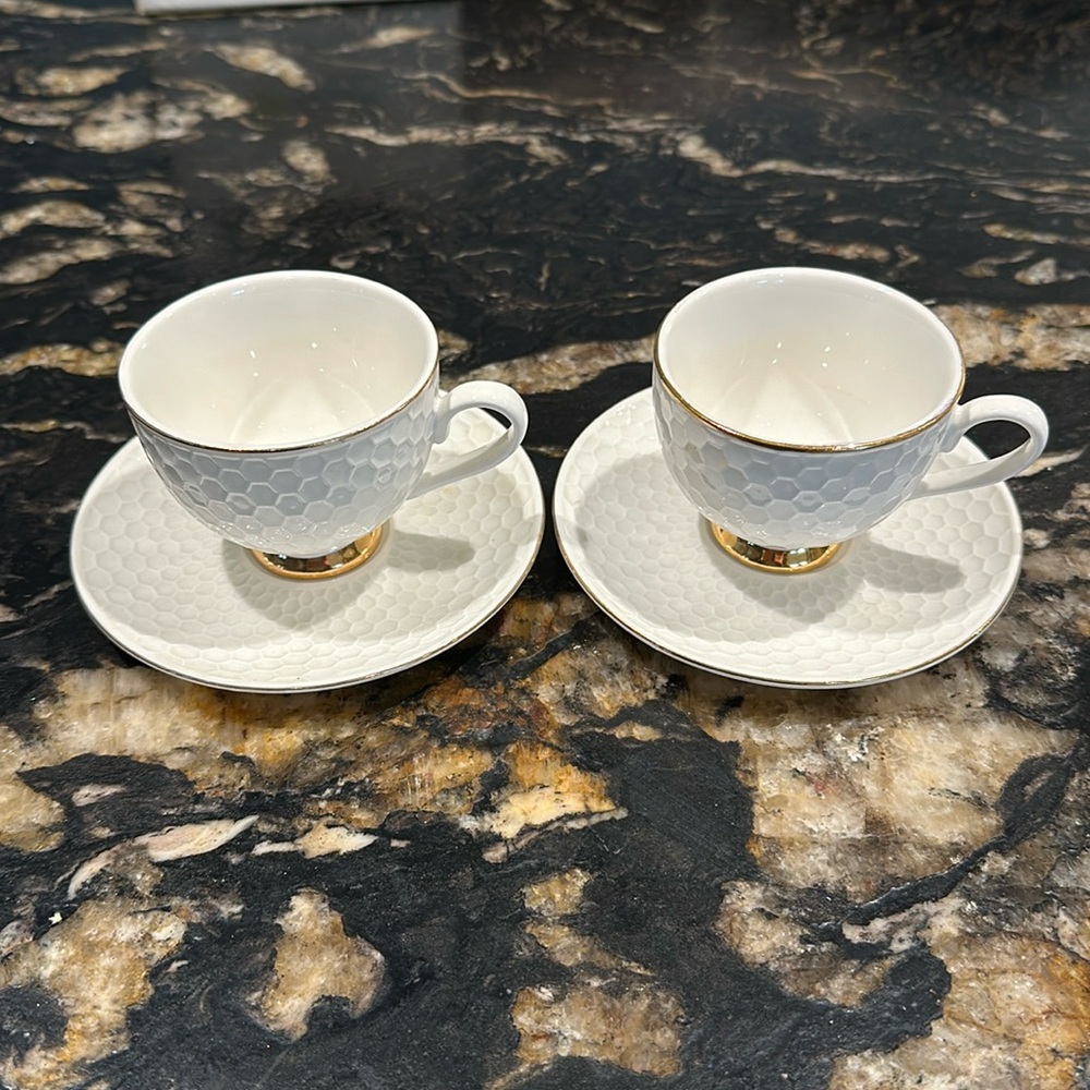 Tea cups with saucers
